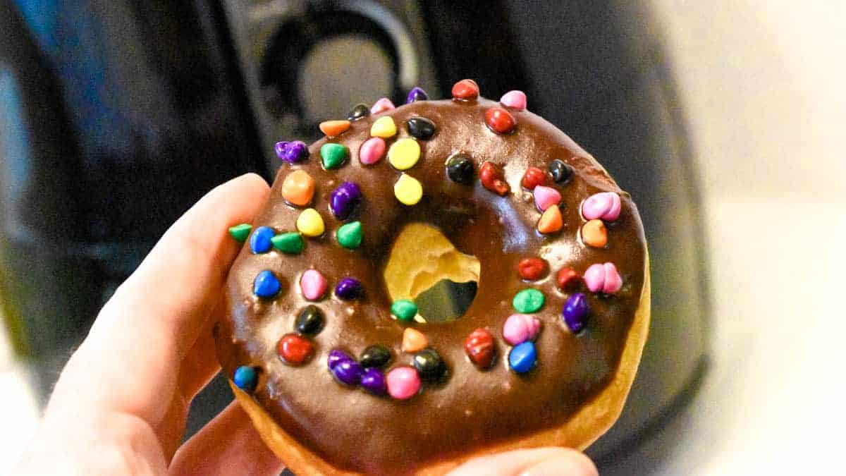 Air Fryer Donuts with chocolate glaze and sprinkles.