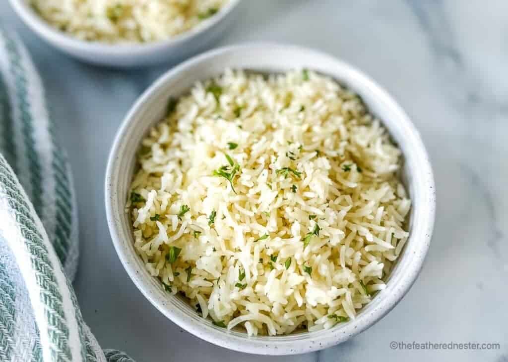 Fluffy grains of basmati rice in a serving bowl.