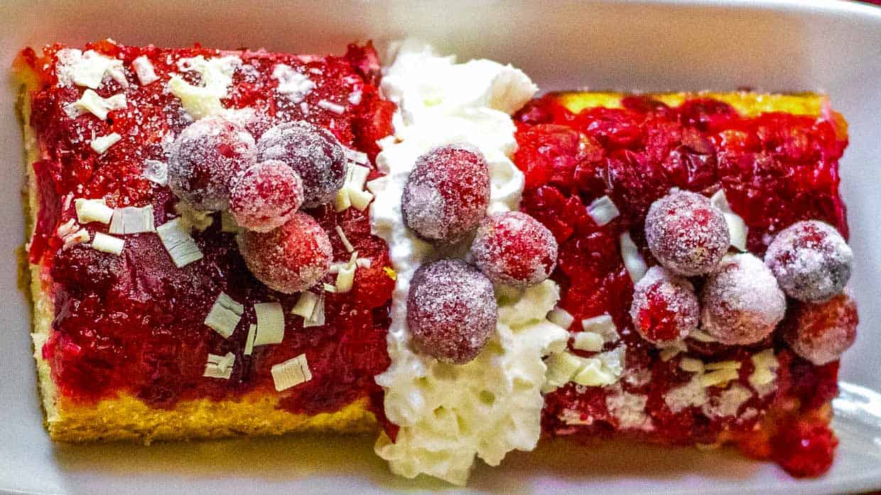 Top view of cranberry upside down cake with sugared cranberries.