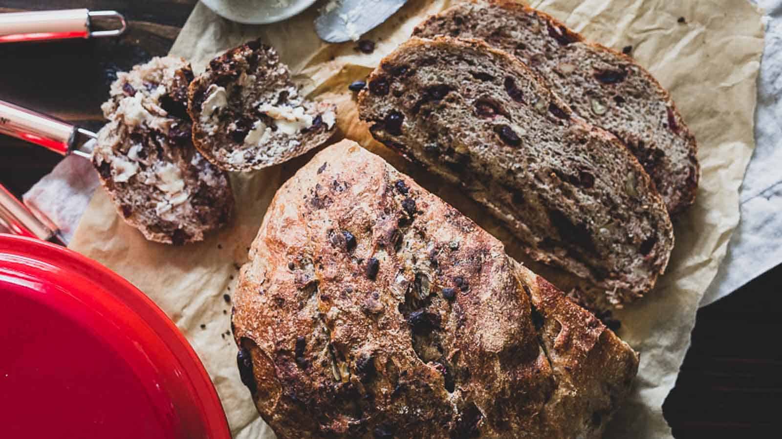 A loaf of bread is sitting on a piece of paper.