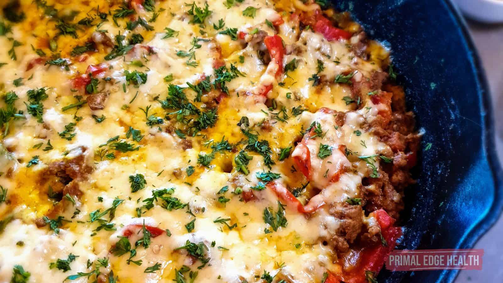 Cheesy Ground Beef Taco Skillet garnished with fresh cilantro.