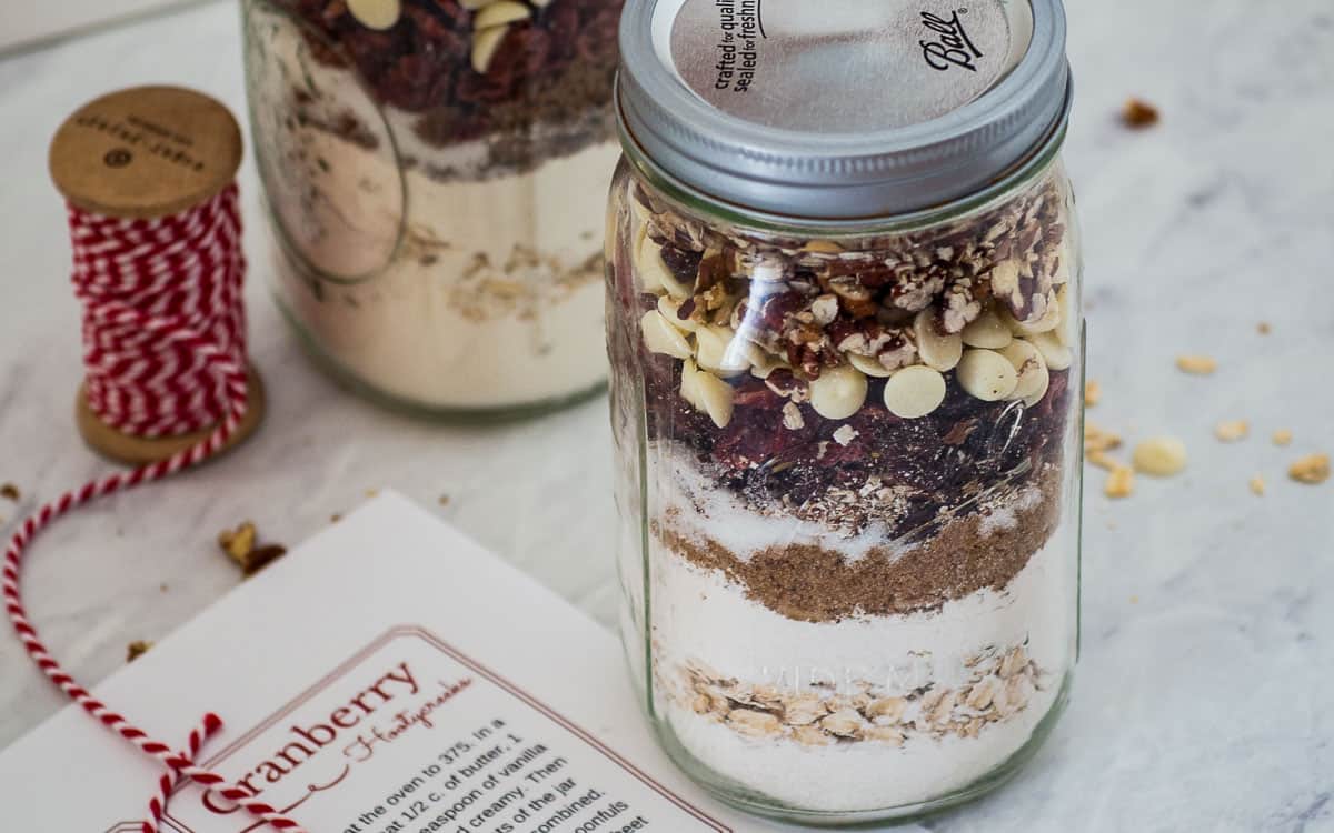 A mason jar filled with cranberry hootycreek mix.