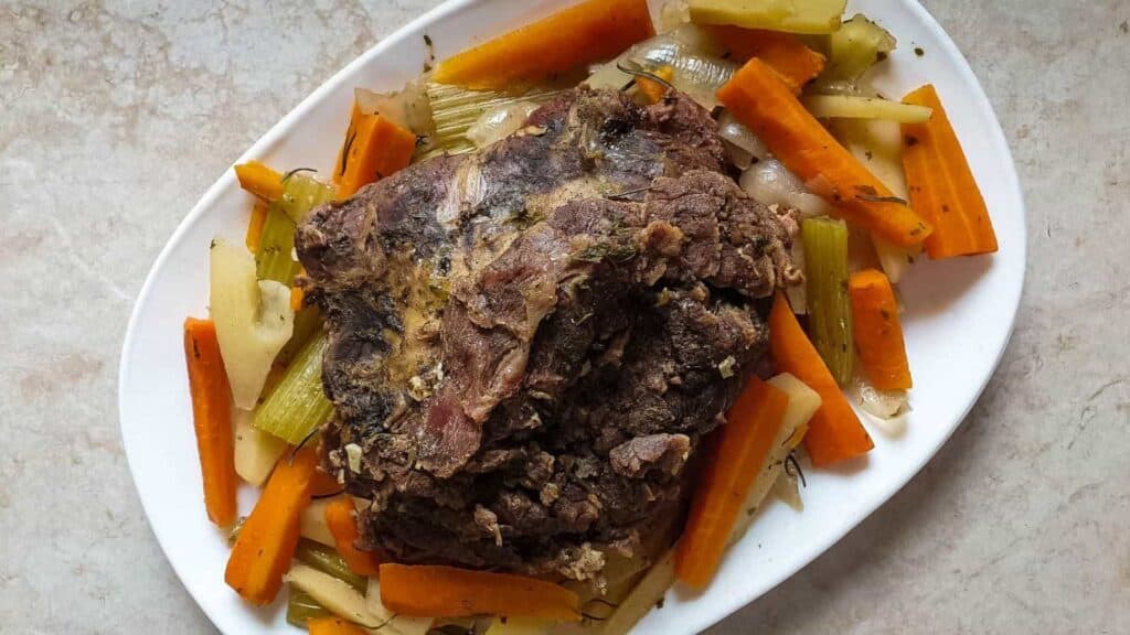 Slow cooker pot roast with parsnip and carrots. 