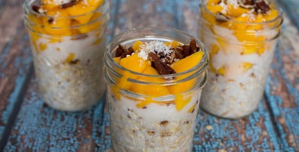 Three mason jars filled with easy breakfast.