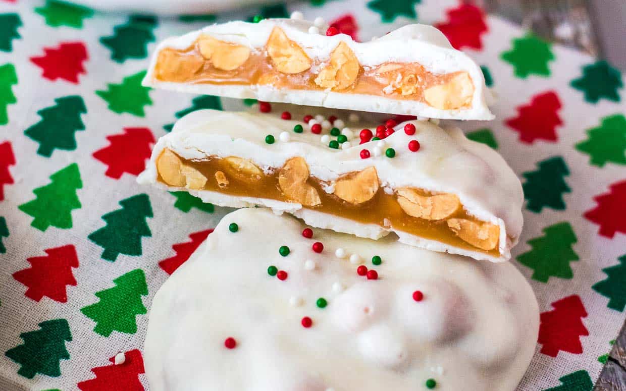 A plate of white chocolate caramel candy on a napkin.