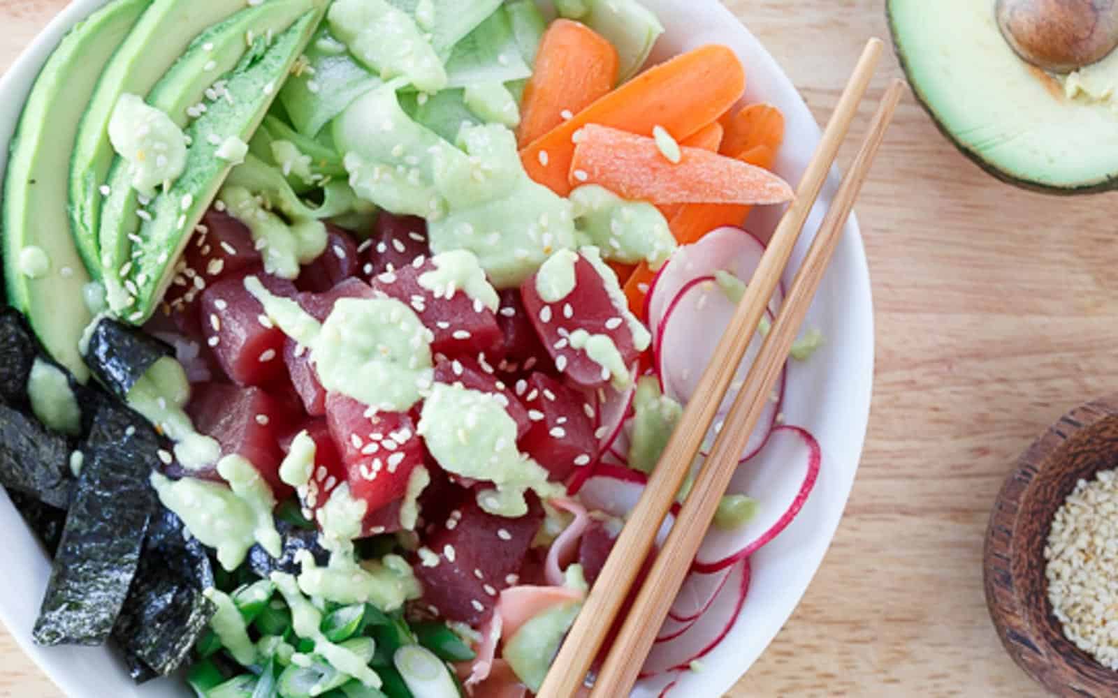 Tuna sushi bowl with wasabi avocado dressing.