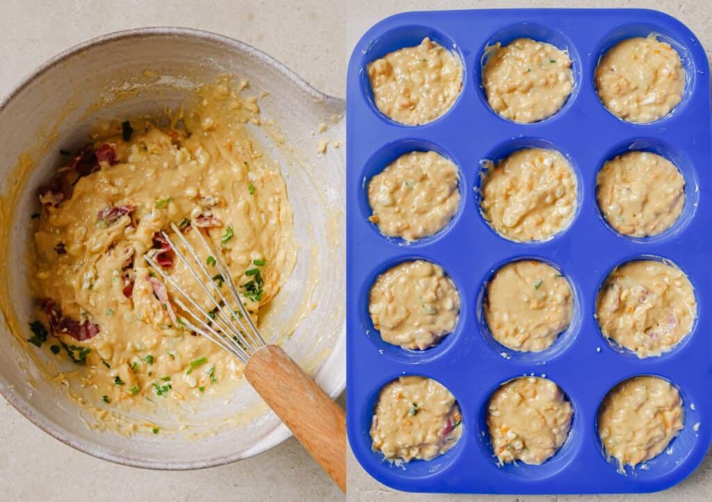 A muffin tin filled with muffin batter and a whisk.