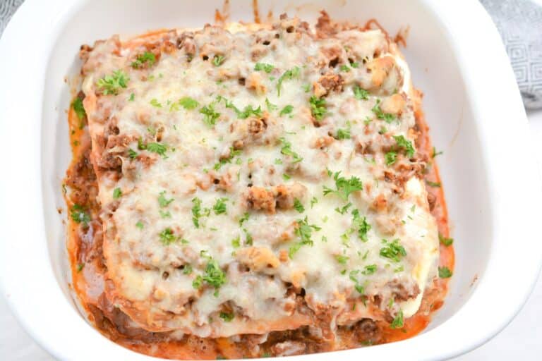 A casserole dish filled with meat and cheese.