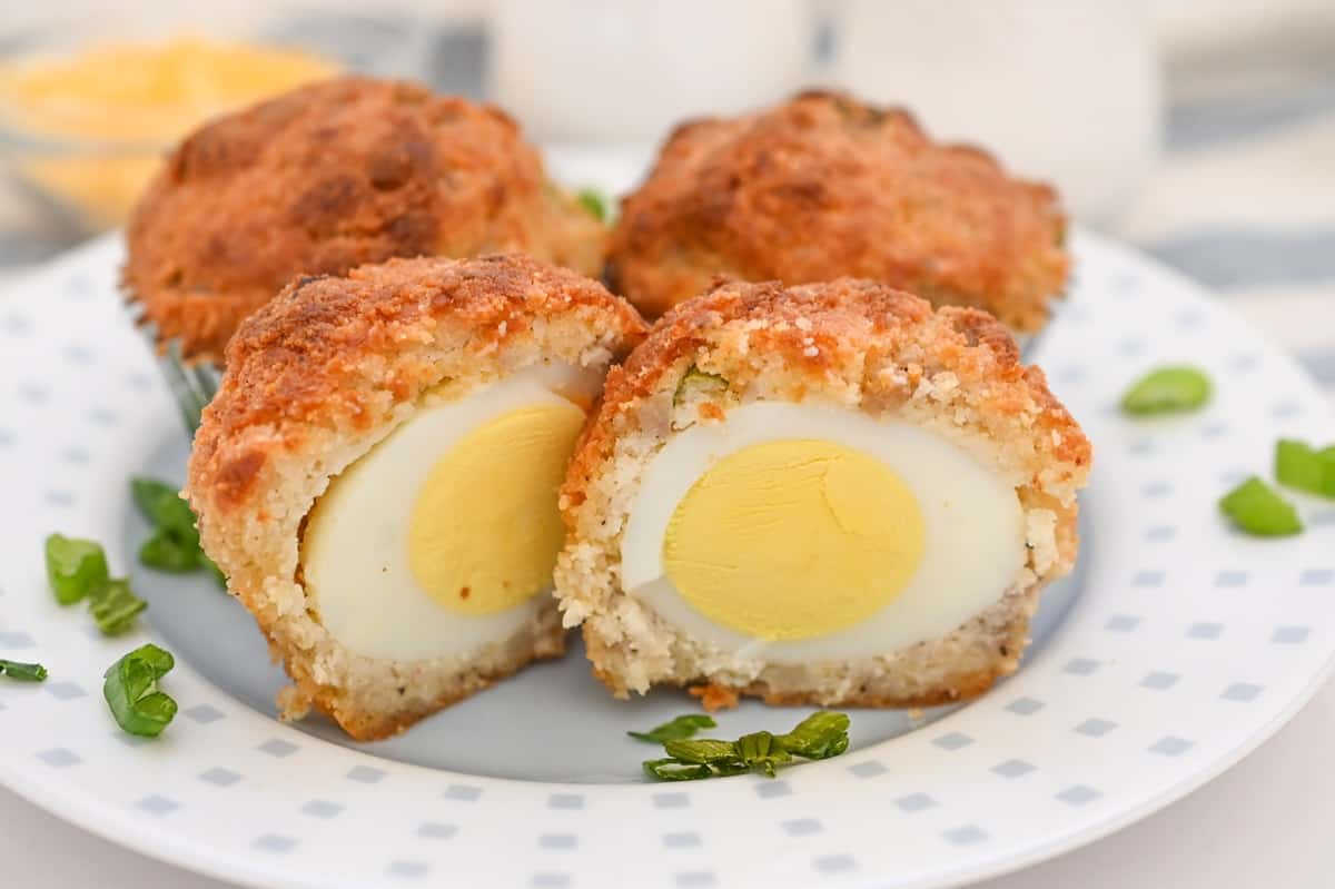 Fried egg muffins on a white plate.