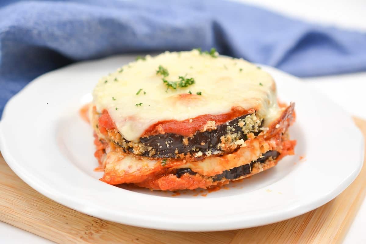 Eggplant lasagna on a white plate.