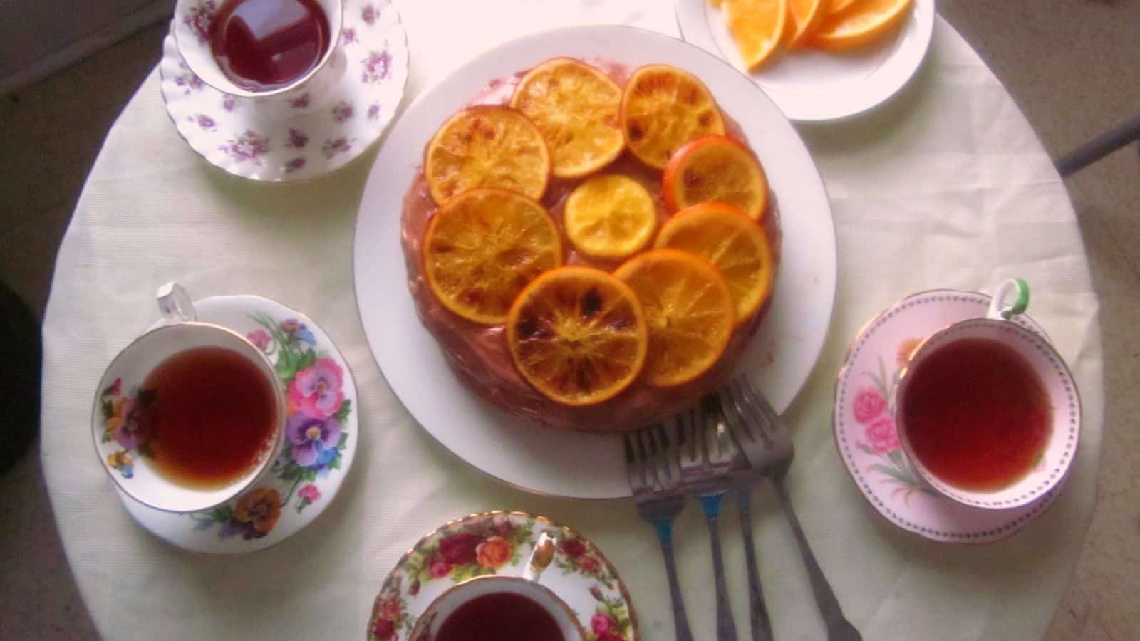 A plate with refreshing orange slices, perfect for winter fruit recipes.