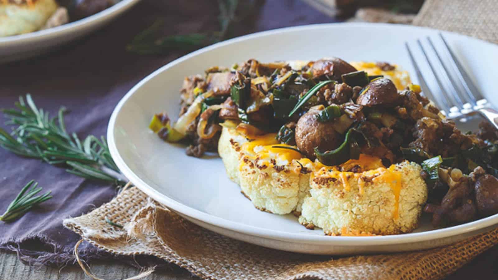 Beef cheddar topped cauliflower steaks.