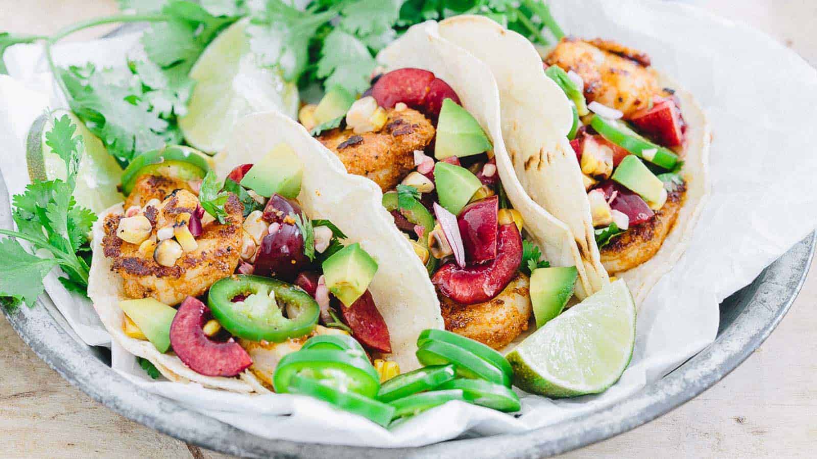 Blackened shrimp tacos with jalapeño corn salsa.