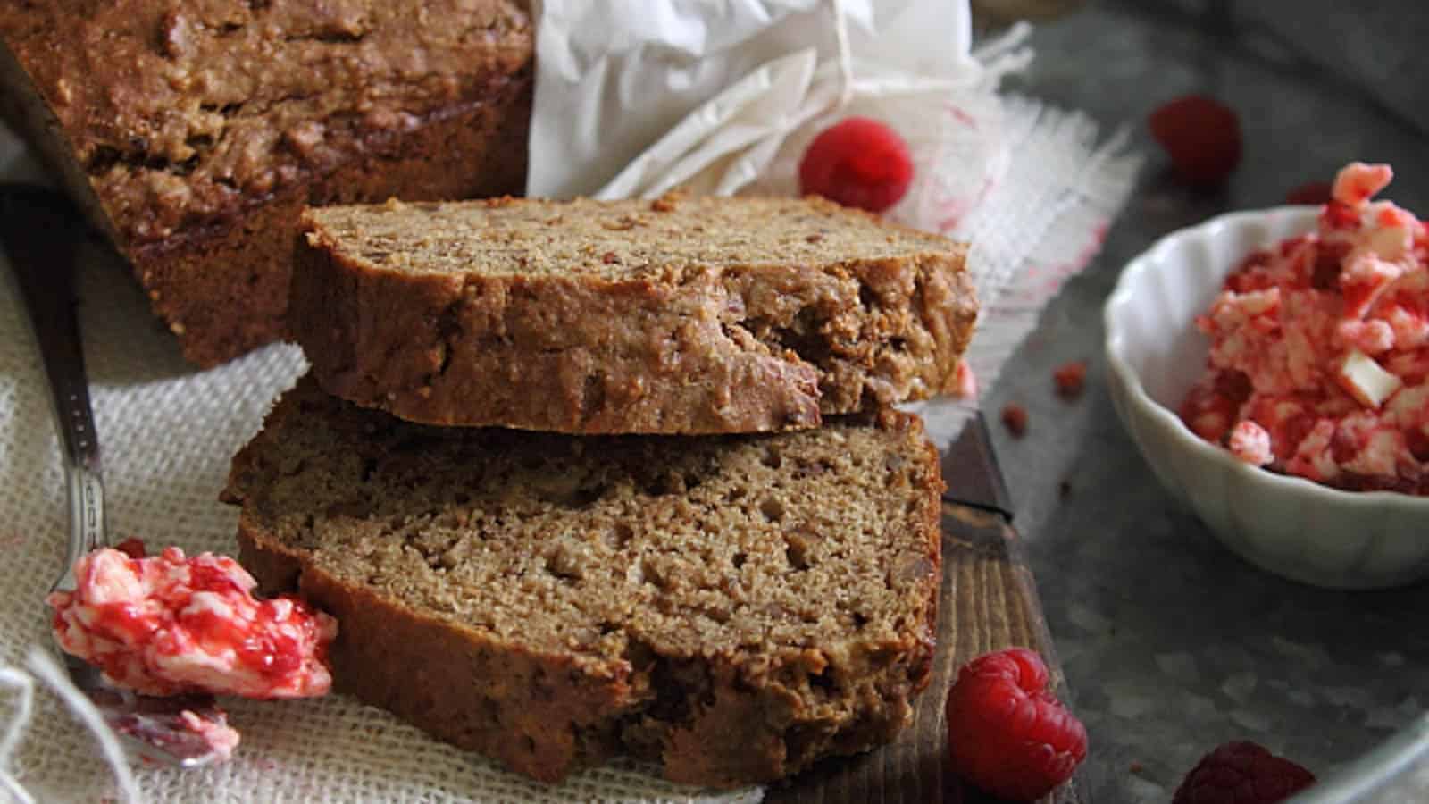 Cinnamon sugar banana pecan bread slices served with raspberry butter.