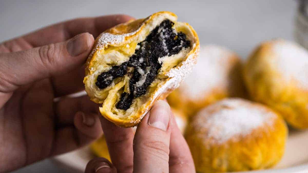 Biscuit stuffed with an oreo broken in half to show insides.