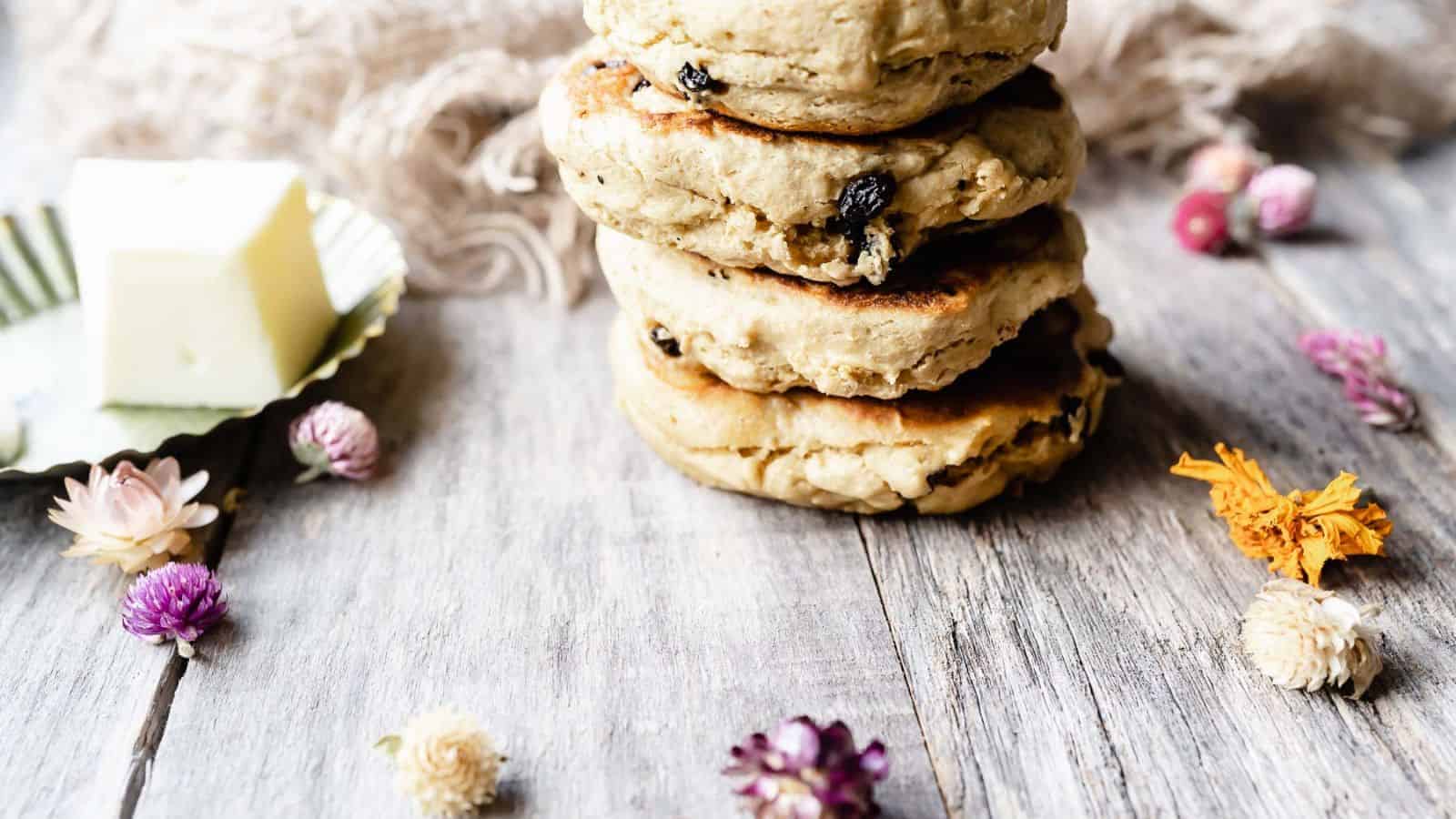 A stack of Scottish bannocks on a wooden table.